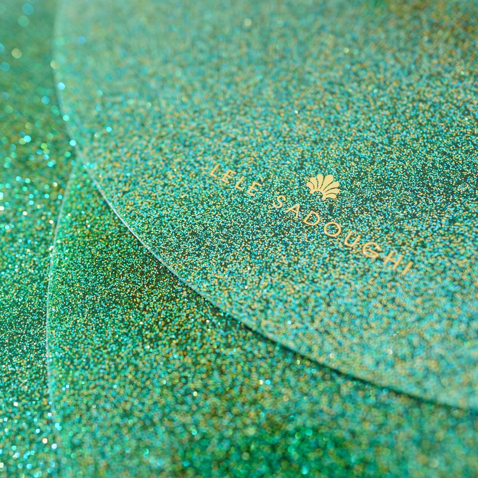 EMERALD GLITTER LUNA ROUND SET OF 4 PLACEMATS