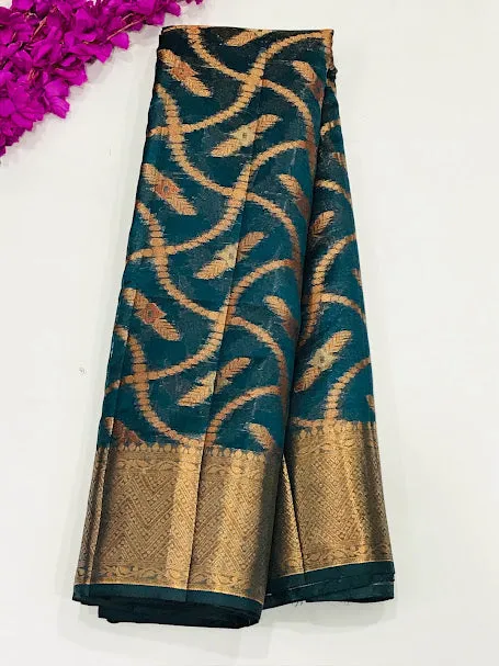 Stunning Teal Green Colored Silk Cotton Saree With Zari Work