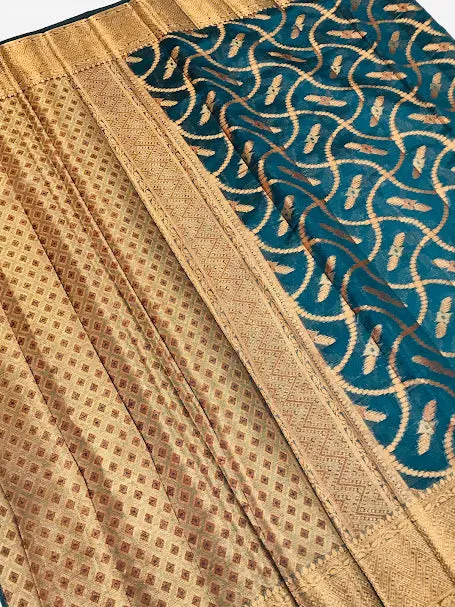 Stunning Teal Green Colored Silk Cotton Saree With Zari Work